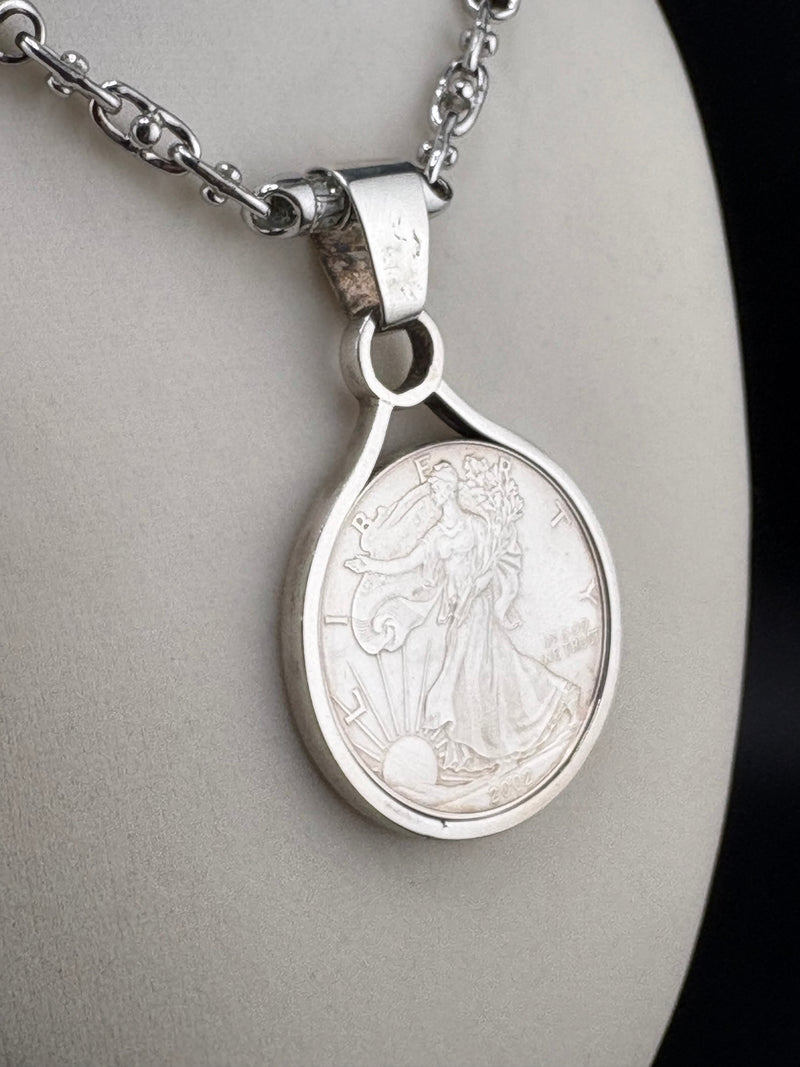 .925 Sterling Silver Pendant housing a 2002 Silver Dollar Coin – 44.6mm / 2.75"